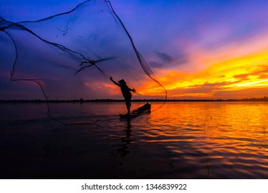 fisherman-throwing-fishing-net-during-260nw-1346839922